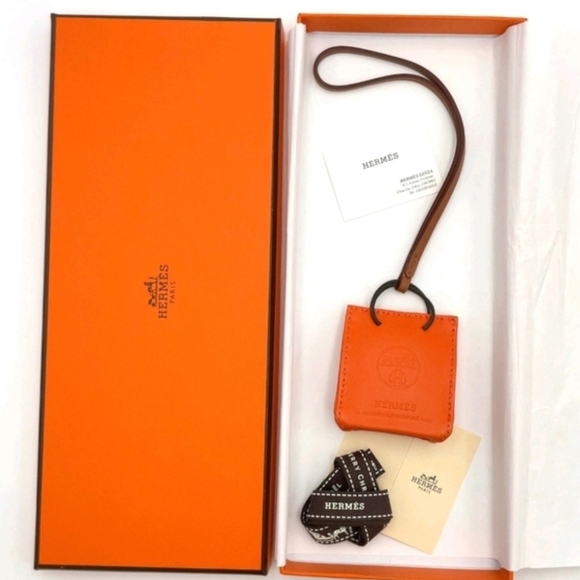 Hermes Accessories - HERMÈS ORANGE LEATHER MINI POUCH BAG CHARM KEY HOLDER + BOX